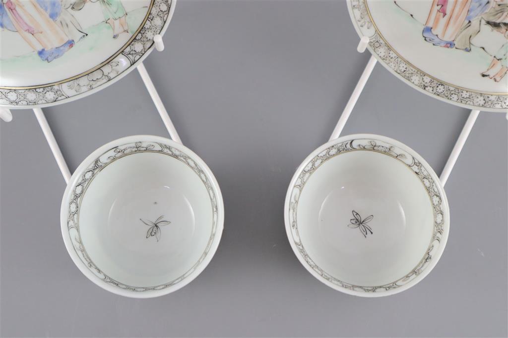 A pair of Chinese famille rose 'sages tea bowls and saucers, Qianlong period, saucers 11.7cm diameter